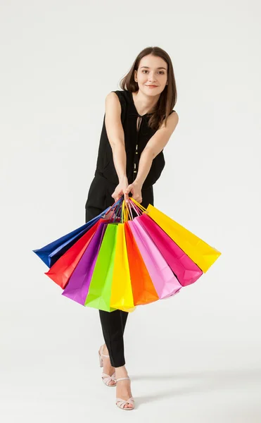 Woman holding paper bags — Stock Photo, Image