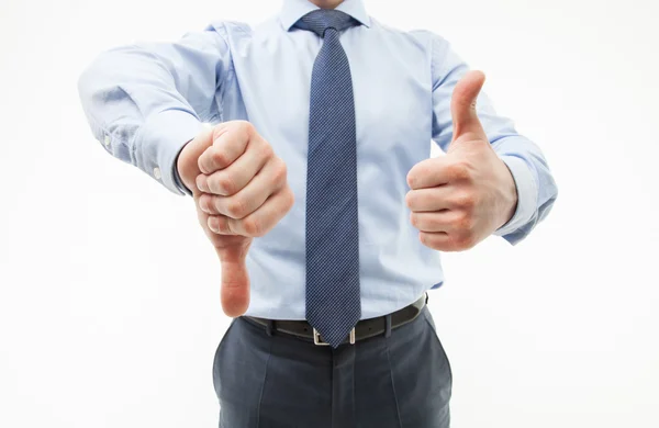 Geschäftsmann zeigt Daumen nach unten und Daumen nach oben — Stockfoto