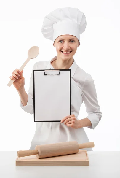 Lachende chef vrouw kok holding lege Klembord en lepel — Stockfoto