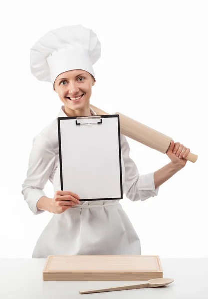 Smiling chef woman cook holding blank clipboard and rolling pin — Stock Photo, Image