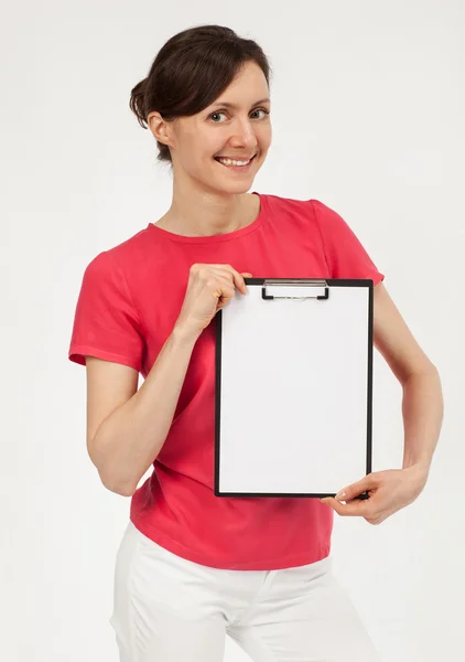 Woman showing clipboard — Stock Photo, Image