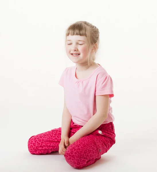 Girl sitting on the floor — Stock Photo, Image