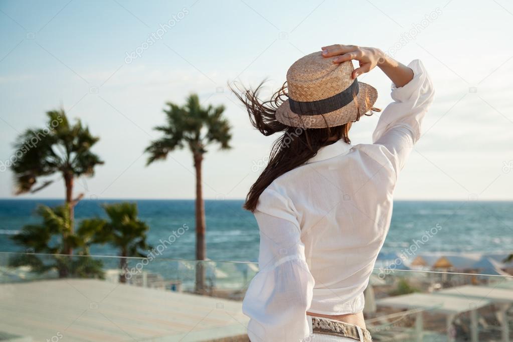 Young woman looking on the sea