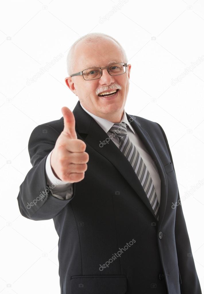 Smiling businessman showing thumb up sign