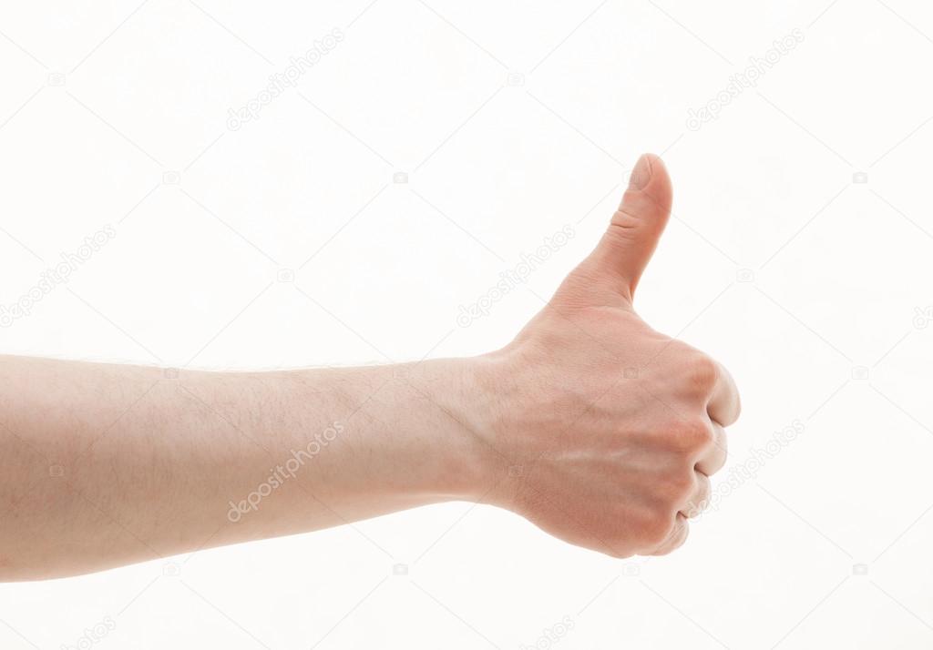 Male hand showing thumb up sign