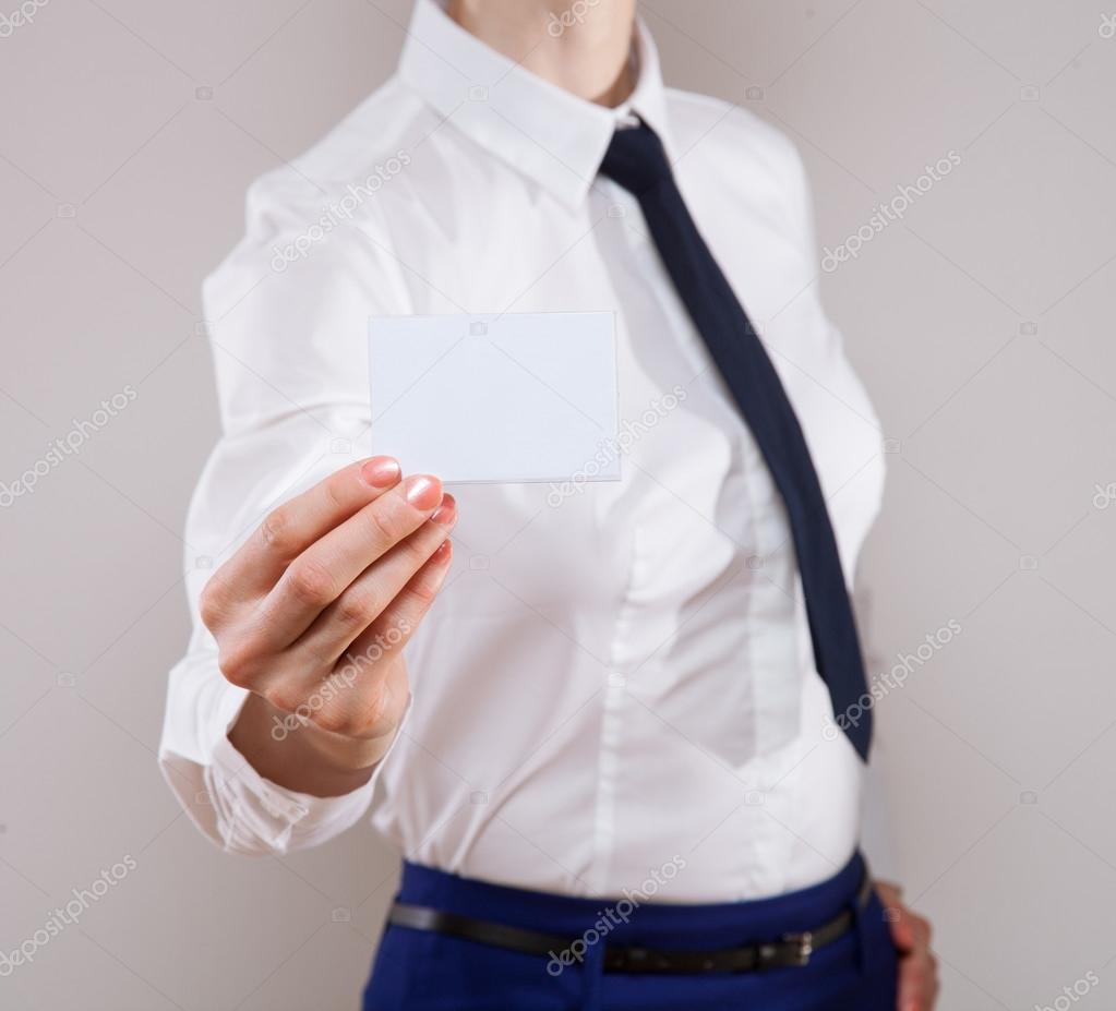 Businesswoman showing business card