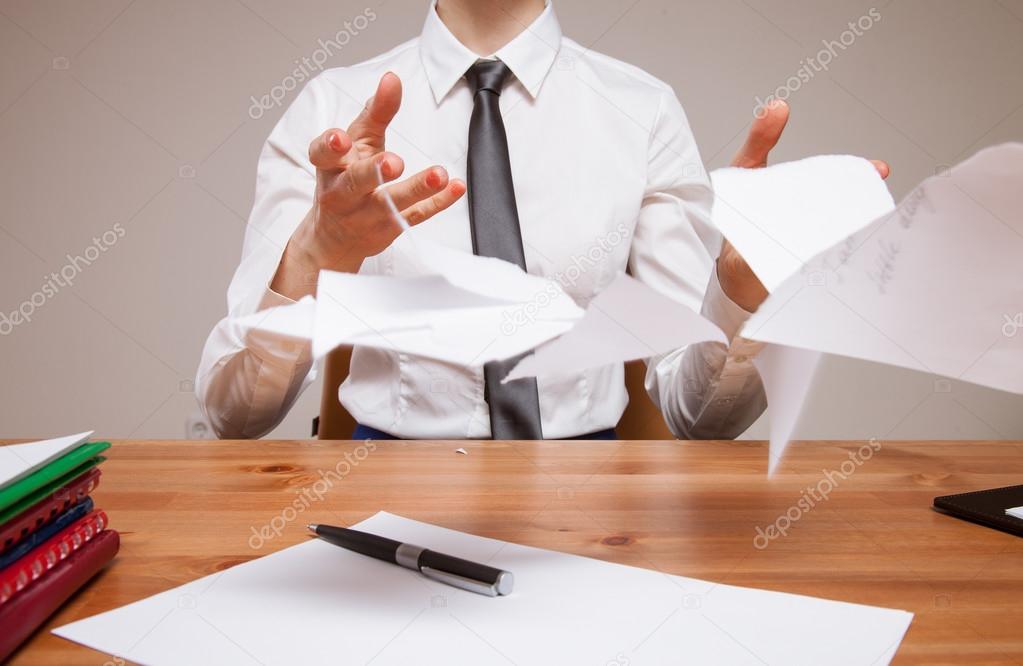 Business woman throwing disrupt documents