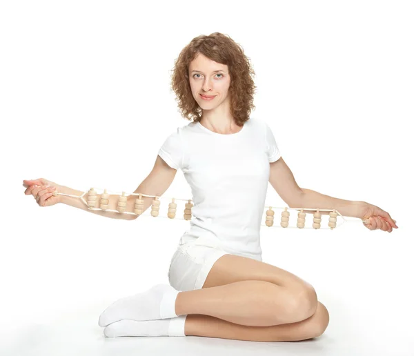 Menina segurando massageador — Fotografia de Stock