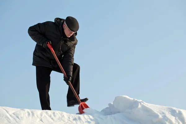 Hombre quitando nieve — Foto de Stock