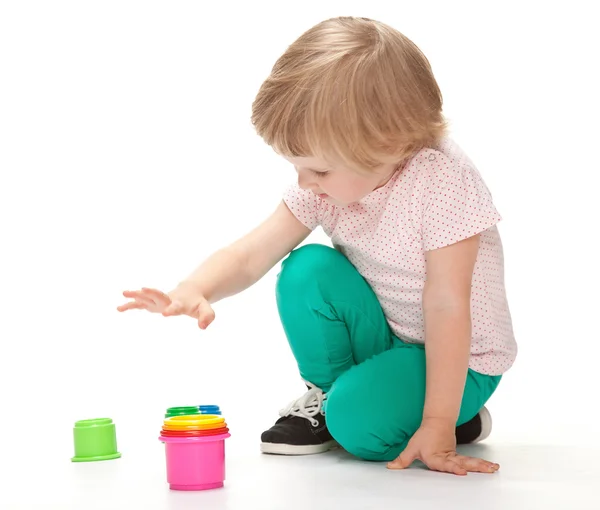 Chica jugando con juguetes — Foto de Stock