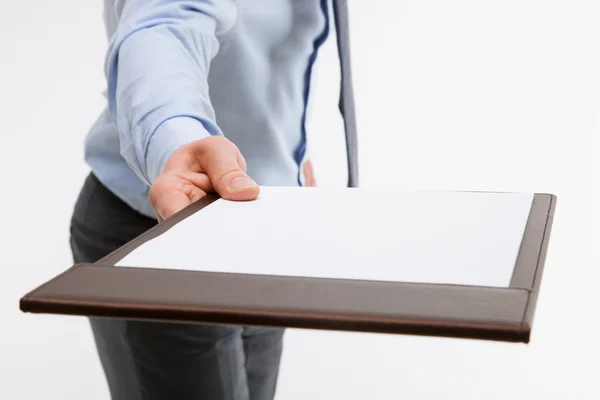 Businessman holding a clipboard — Stock Photo, Image