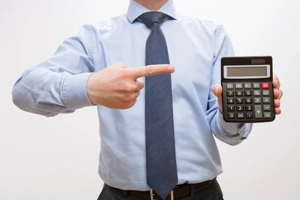Zakenman houden een rekenmachine — Stockfoto