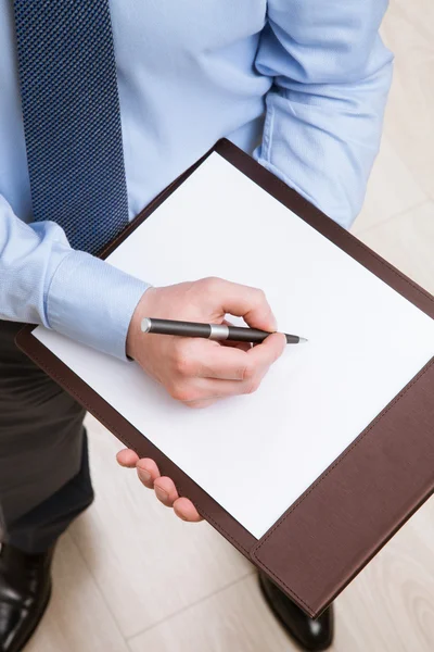 Businessman signing a contract — Stock Photo, Image