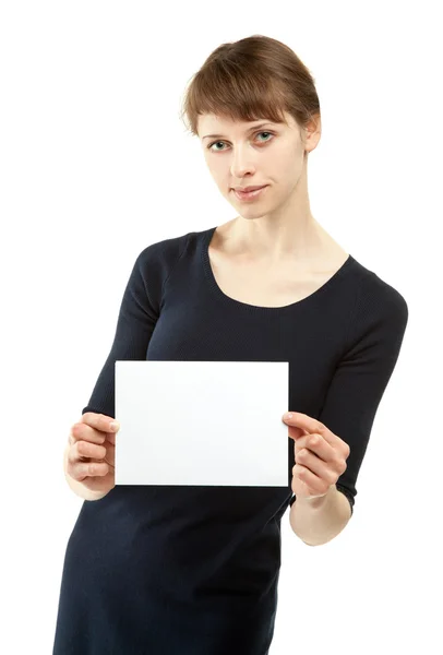 Donna con un foglio di carta bianco — Foto Stock