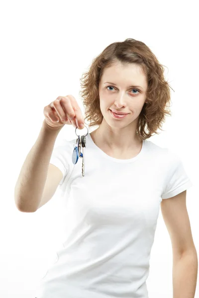 Girl holding keys — Stock Photo, Image