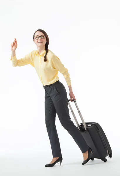 Femme allant avec une valise — Photo