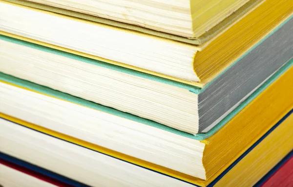 Closeup of multicolored stacked books — Stock Photo, Image