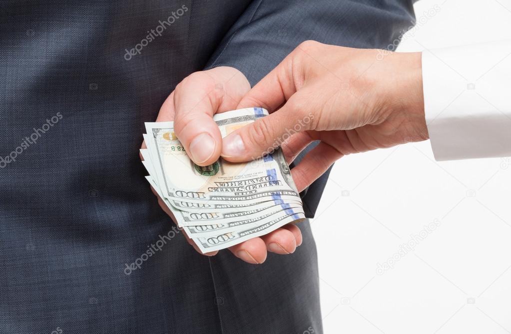 Businessman giving bribe