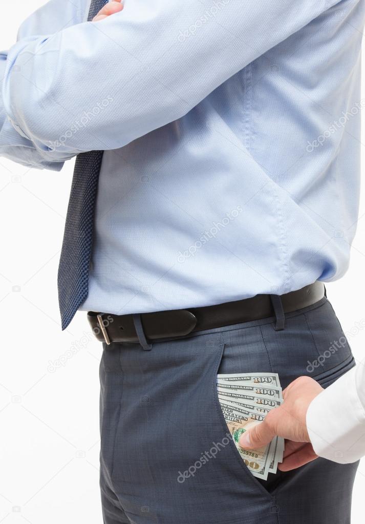 Giving a bribe into a pocket
