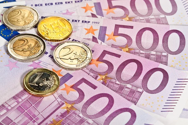 Close-up van bankbiljetten en munten — Stockfoto