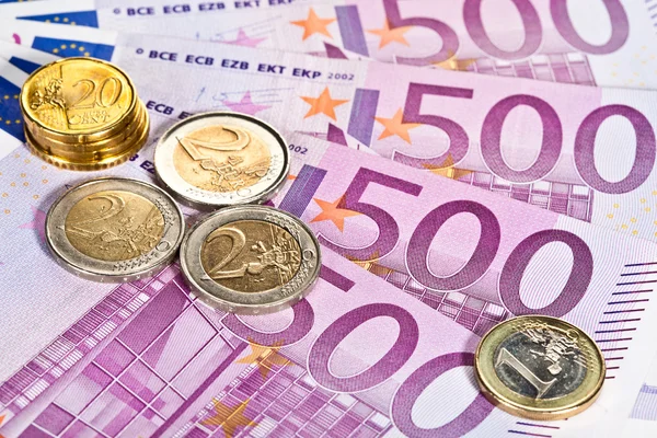 Nahaufnahme von Banknoten und Münzen — Stockfoto