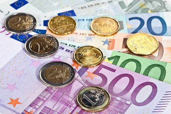Euro bancnote și monede — Fotografie, imagine de stoc
