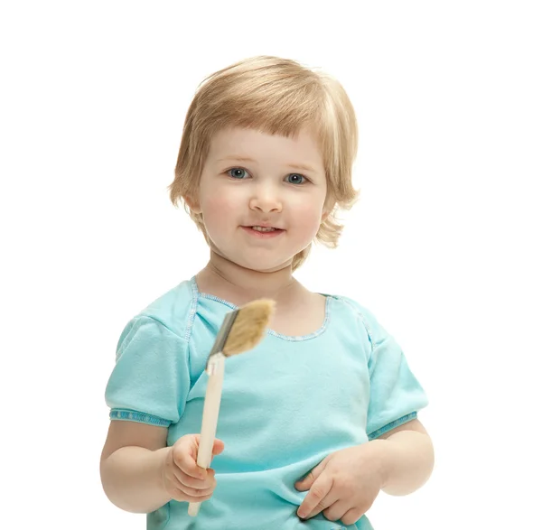 Criança segurando pincel — Fotografia de Stock