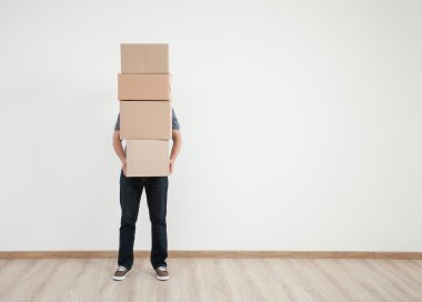 Man carrying boxes clipart