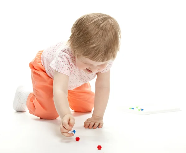 Girl playing with mosaic — Stock Photo, Image