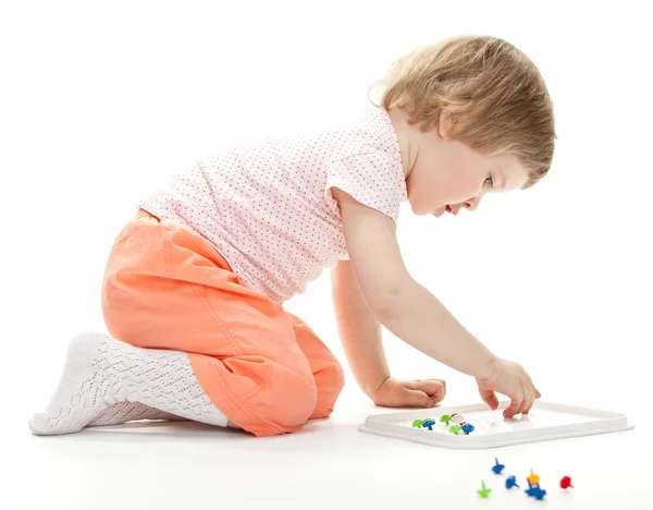 Girl playing with mosaic — Stock Photo, Image