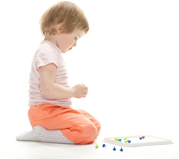 Girl playing with mosaic — Stock Photo, Image