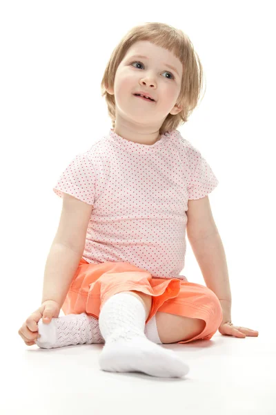 Child sitting on the floor — Stock Photo, Image