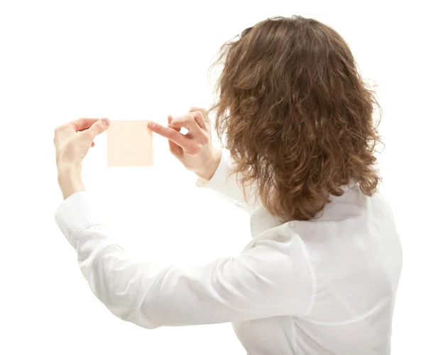 Woman looking at paper note — Stock Photo, Image
