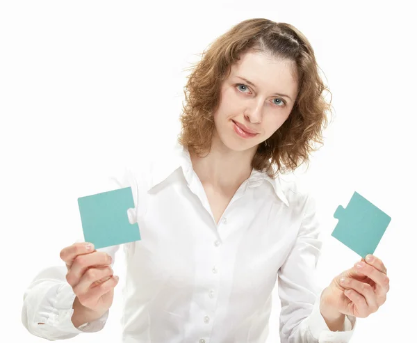 Woman showing blank puzzles — Stock Photo, Image