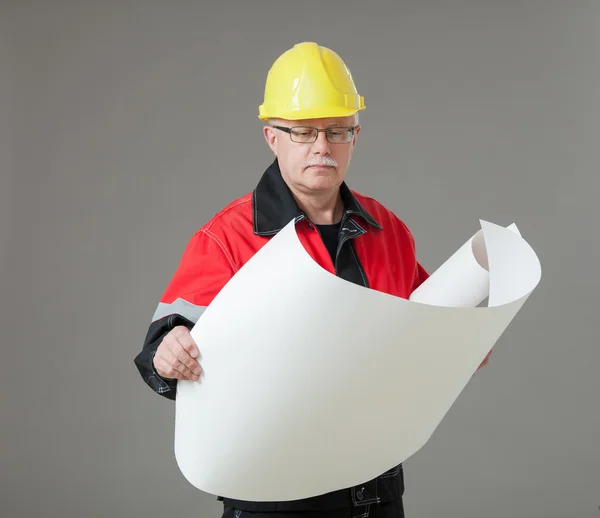 Builder examining a new project — Stock Photo, Image