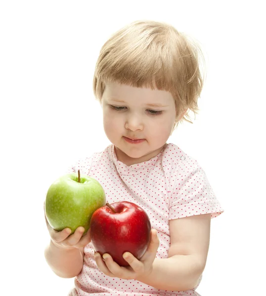 Ребенок держит яблоки — стоковое фото