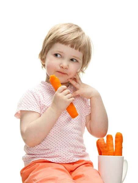 Baby eating carrot — Stock Photo, Image