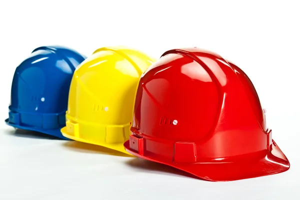 Veelkleurige bouw hardhats — Stockfoto