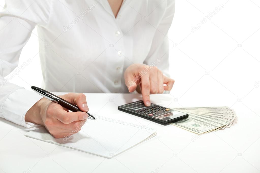 Accountant calculating revenues and costs