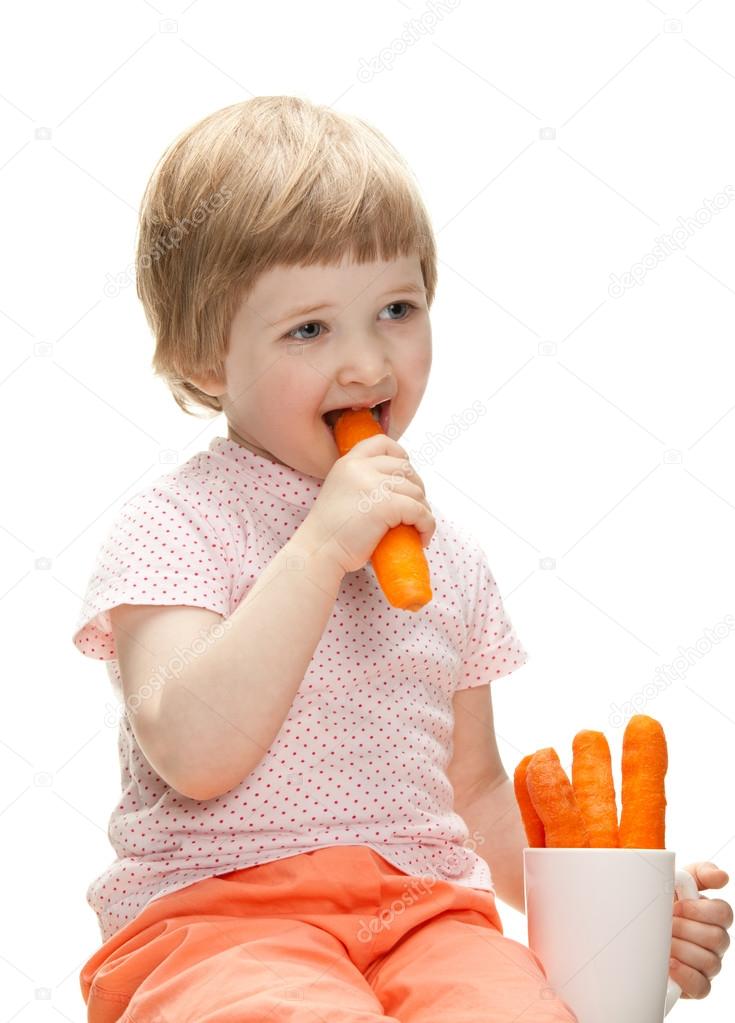 Baby eating carrot Stock Photo by ©zestmarina 79206698