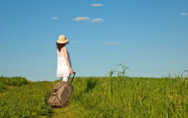 Bir bavulla seyahat Bayan