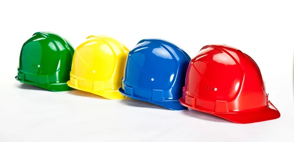Hardhats de construção multicoloridos — Fotografia de Stock