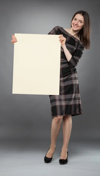 Woman holding placard — Stock Photo, Image