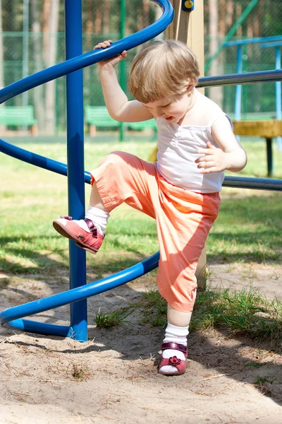 Child playing in a stadium — Stock Photo, Image