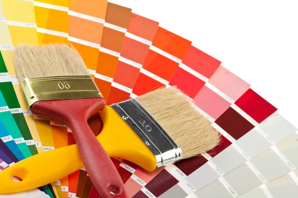 Paintbrushes and color samples Royalty Free Stock Images