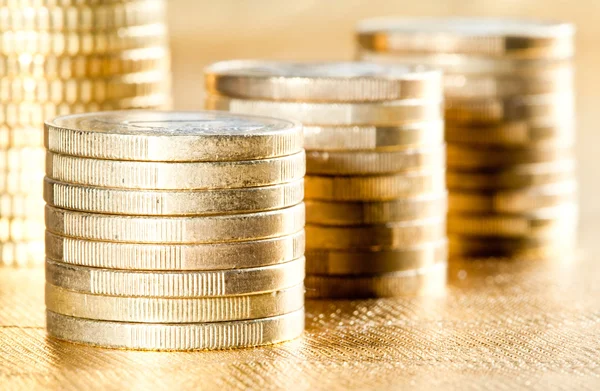 Many stacked coins — Stock Photo, Image