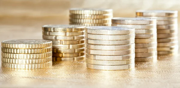 Many stacked coins — Stock Photo, Image