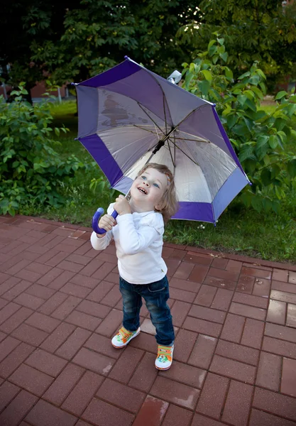 Little girl with umbrella — Stock Photo, Image