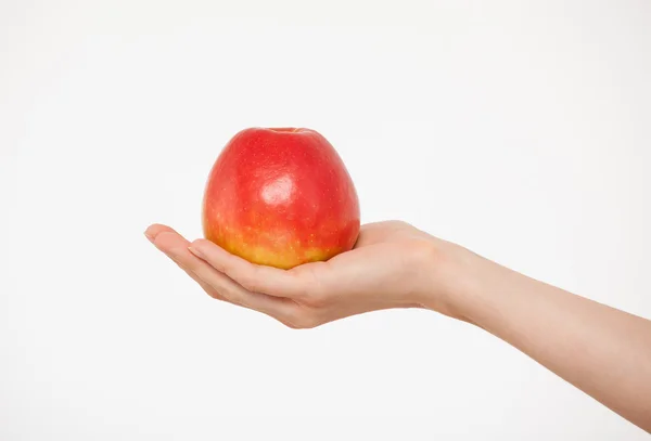 Hand innehav apple — Stockfoto