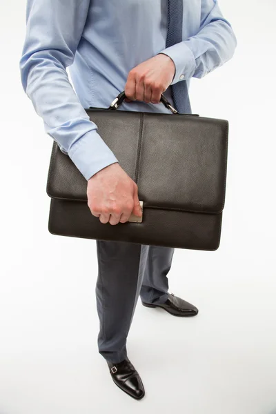 Biznesmen trzymający walizkę — Zdjęcie stockowe